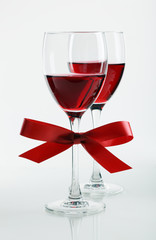 Glass of red wine on a white background and with soft shadow