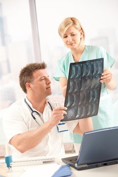 Doctor and nurse with x-ray image