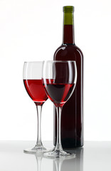 bottle with red wine and glass