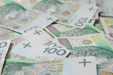 Obraz na płótnie Canvas Streszczenie tle z banknotów polskich 100 pln