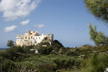 Fototapeta na wymiar Hrissoskalitissa Monastery on isolated rock - Crete