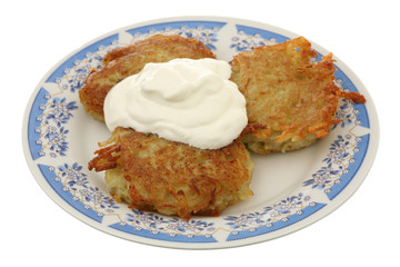 Potato fritters with sour cream