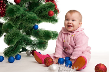 Fototapeta na wymiar Little girl at Christmas time