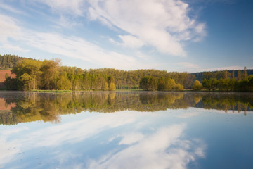 Fototapeta na wymiar Autumn reflection on the pond