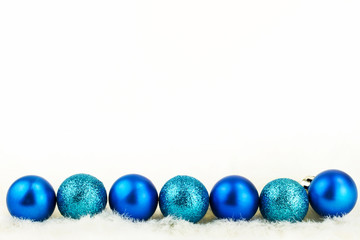 Blue christmas balls isolated on white