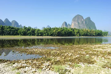 Gordijnen Beautiful Karst mountain landscape in Yangshuo Guilin, China . © xiaoliangge