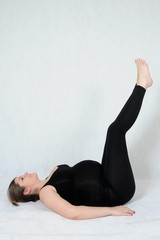 Pregnant woman doing yoga