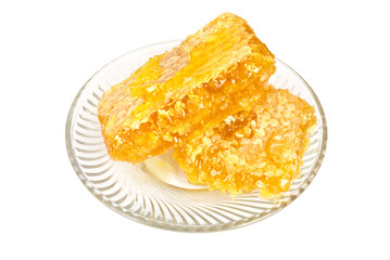 Natural honey on glass saucer