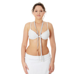 Obraz premium Female measuring her body
