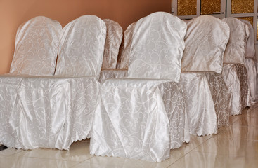 Fototapeta na wymiar Wedding Decorated chairs