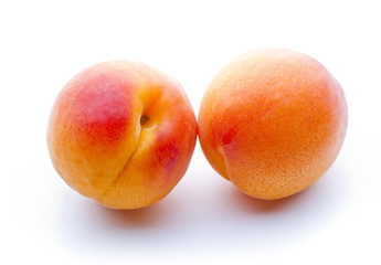 two apricots close-up