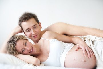 Obraz na płótnie Canvas Young expectant couple