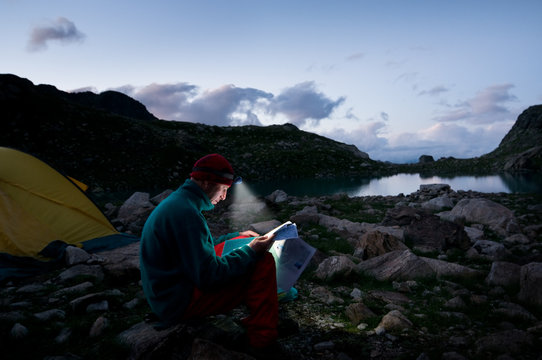 man hiking at night