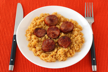 Fried sausages with lentil