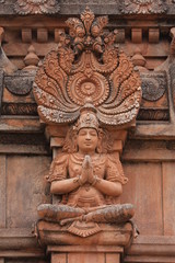 Ancient yoga statue at temple in Hampi, India