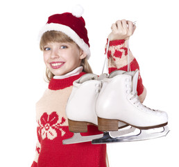 Child holding figure skates. Isolated.