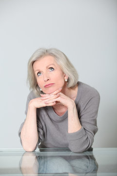 Portrait of senior woman looking pensively