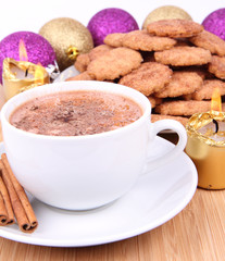 Cup of hot chocolate with cinnamon and cinnamon cookies
