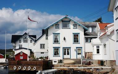 Typical white wooden houses in Lyngor, Norway