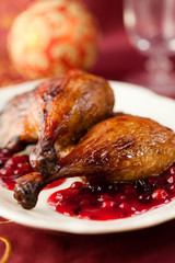 Roast duck legs with cranberries for Christmas
