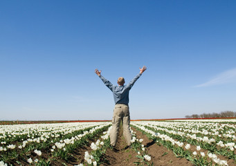 Man with his arms wide open