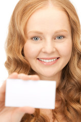 Fototapeta premium happy woman with business card