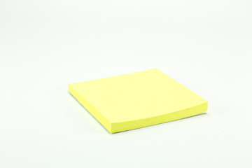 Yellow memo stick isolated on white background