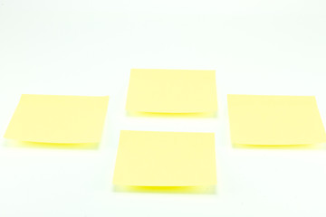 Yellow memo stick isolated on white background