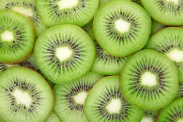 Papier Peint photo Tranches de fruits Fond de kiwi