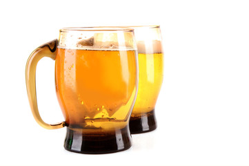 Mugs of beer isolated on white
