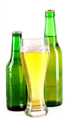 Bottle of beer and mug isolated on white