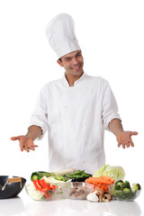 Young nepalese man chef, fresh vegetables