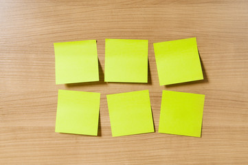 Fototapeta premium Many reminder notes on the wooden background