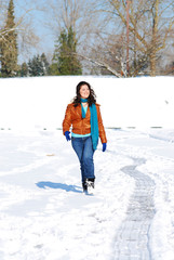 Girl walking in the snow