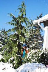 child playing in snow