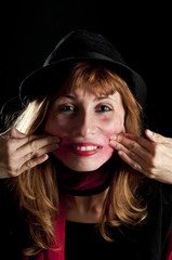 Girl with hat and lipstick deformed her face
