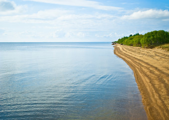 Opened sand coast of the Chudsky  Lake. Russia
