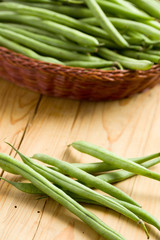 bean pods on wooden table