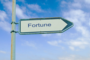 Road sign to fortune