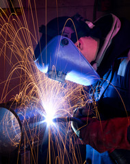 Fototapeta MIG welding on steel tube obraz