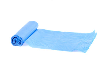 roll of blue garbage bags on the white background