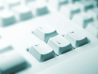Arrow Keys Of A White Keyboard