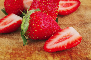 raw ripe strawberry on wood