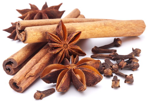 Cloves, anise and cinnamon isolated on white background.