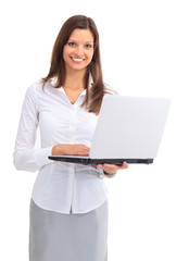 pretty business woman looking at laptop