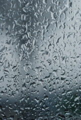 Water droplets on a window / background