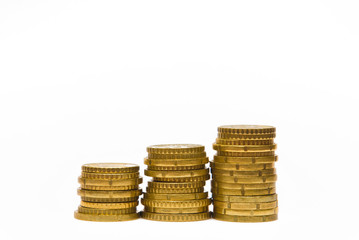 Piles of euro coins isolated on white