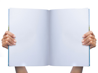gesture of womans hand holding white magazine