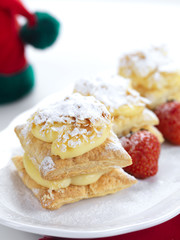 dessert with cream and strawberries