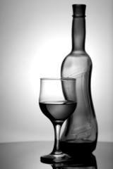 wineglass and bottle on the desk. kitchen still-life